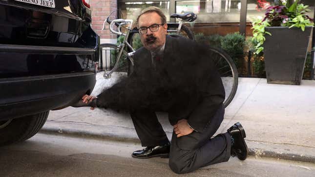 Image for article titled EPA Administrator Proves Carbon Emissions Not Harmful By Inhaling Directly From Truck’s Tailpipe