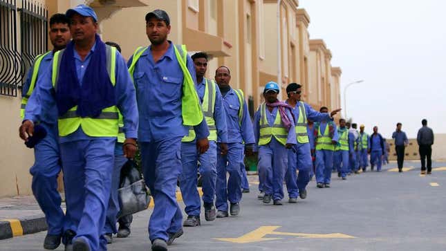 Image for article titled Report: Underpaid Migrant Laborers Working 18 Hours Per Day On FIFA Legal Defense