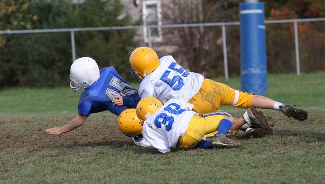 Image for article titled Health Experts Say Tackle Football Poses Little Risk For Children Whose Brains Already Don’t Work That Well