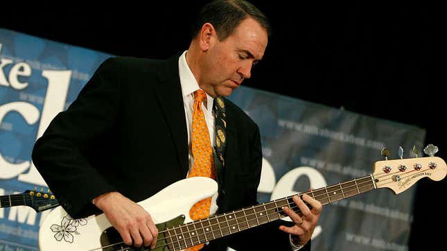 Image for article titled So, here&#39;s Mike Huckabee playing bass with a member of Korn