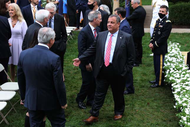 Former New Jersey Governor Chris Christie (C) talks with guests in the Rose Garden after President Donald Trump introduced 7th U.S. Circuit Court Judge Amy Coney Barrett, 48, as his nominee to the Supreme Court at the White House September 26, 2020 in Washington, DC.