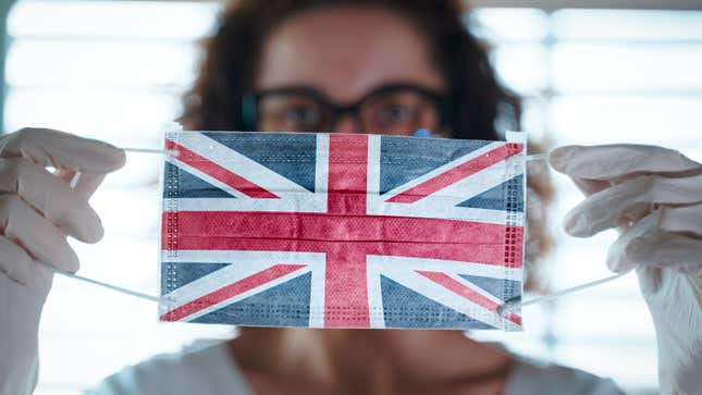 person with Union Jack mask
