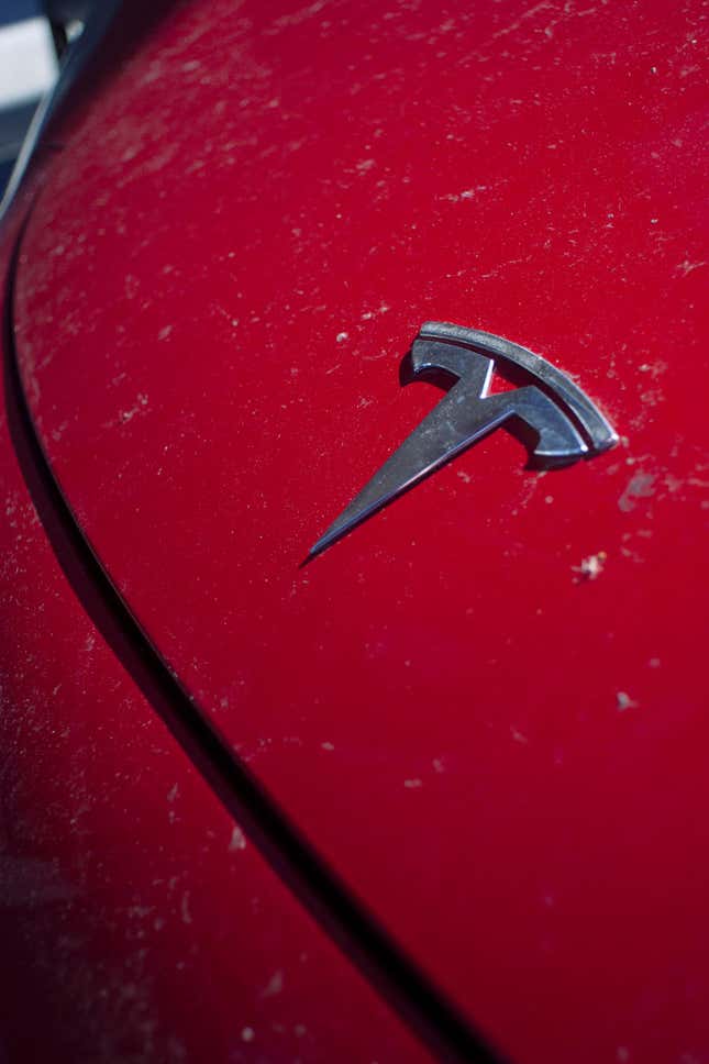 Front end of a new Model 3 with an ill-fitting hood. Reader photo