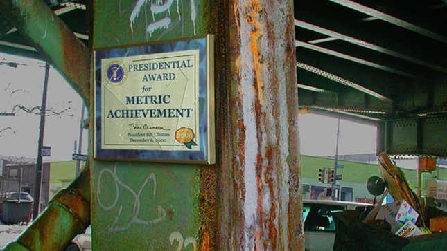 A Presidential Award For Metric Achievement hangs in an area of Detroit renowned for its metric use.