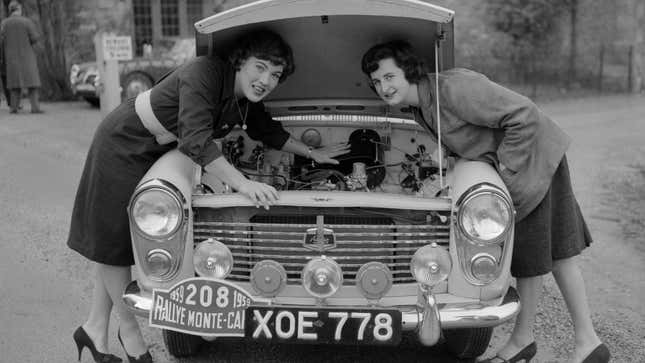 Rally legends Pat Moss and Ann Wisdom under the hood.