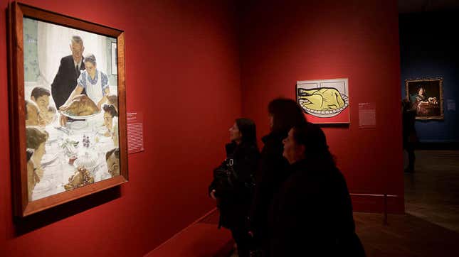 Museum-goers look at Norman Rockwell’s Freedom From Want, aka The Thanksgiving Picture