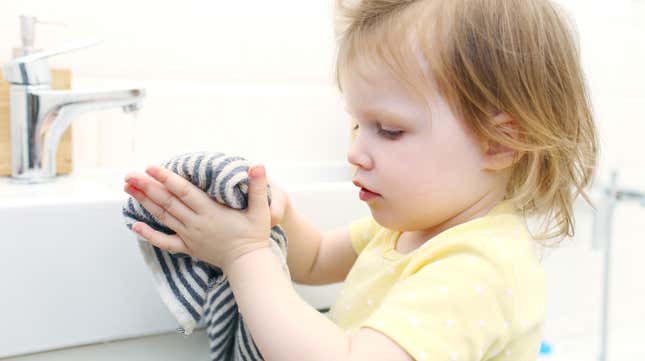 Image for article titled Use a Hair Tie to Hang a Towel Your Kid Can Reach