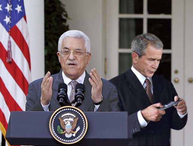 Image for article titled Bush Texting While Mahmoud Abbas Speaks