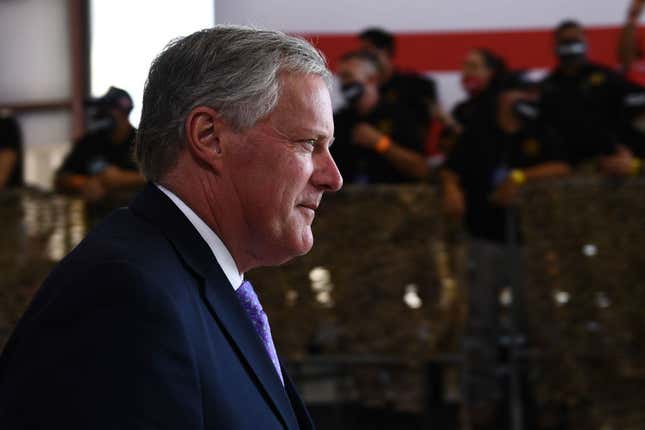 White House Chief of Staff Mark Meadows looks on as the US president delivers remarks on immigration and border security to members of the border patrol at the international airport in Yuma, Arizona on August 18, 2020.