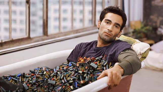 Image for article titled Misinformed Man Riding Out Storm In Bathtub Filled With Batteries