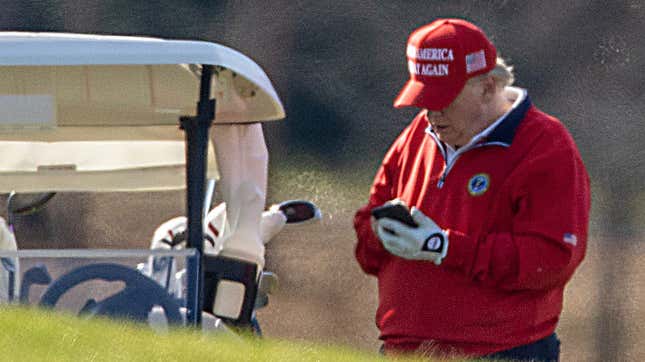 Donald Trump on the phone at Trump National Golf Club in November 2020.