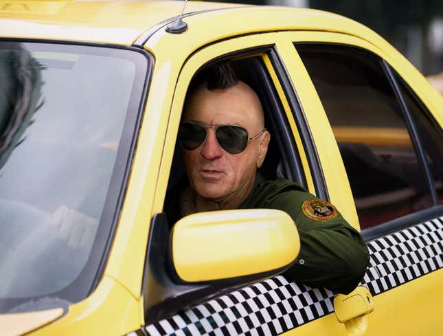 Image for article titled Mohawked, Aviator-Wearing Robert De Niro Idles Cab Outside Suspected Bomb-Maker’s Home