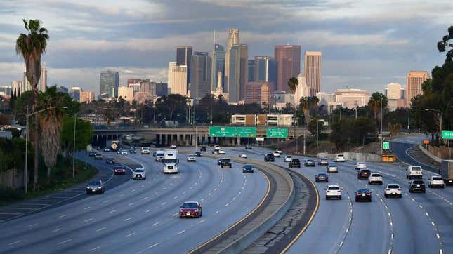 Early morning commuters make their way through light traffic conditions on March 20, 2020 in Los Angeles.