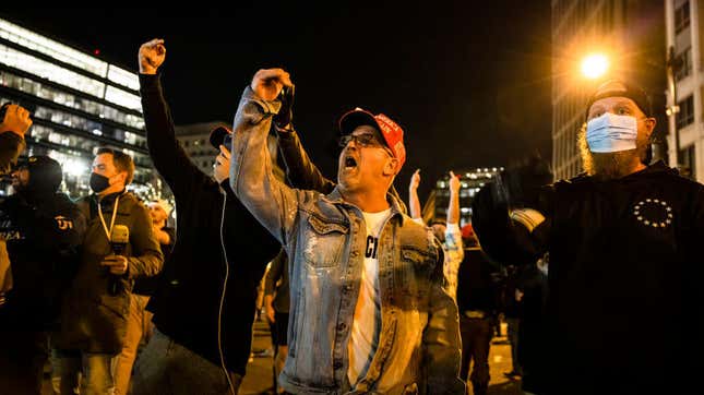 Members of Antifa and Proud Boys clash in the middle of the street following the “Million MAGA March” on November 14, 2020, in Washington, D.C. 