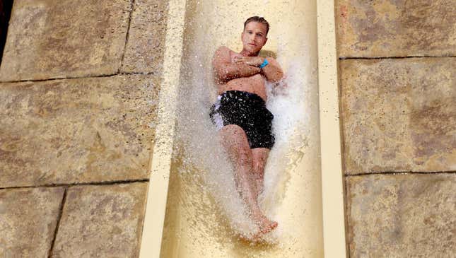 Image for article titled Man Halfway Down Giant Water Slide Remembers Today 9/11