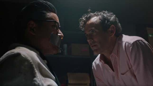 Harland duct-taped to a chair as Billy interrogates him