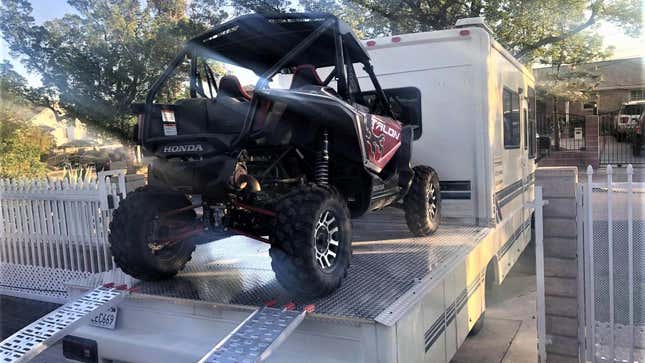 Image for article titled This Slick RV Build Shows An Ingenious Way To Make A Car Hauler