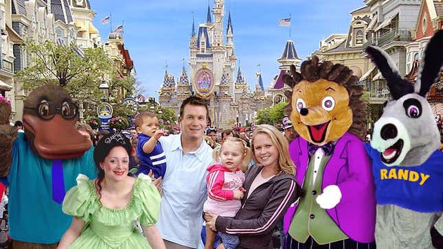 Visitors pose with a few of the unlicensed characters believed to be populating the theme park. 