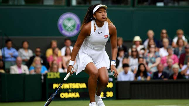 Naomi Osaka challenging a call during her first-round match against Yulia Putintseva at Wimbledon July 1, 2019 in London. 