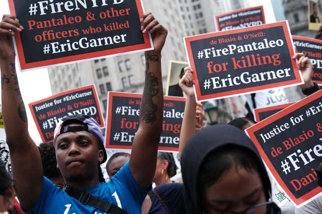 People participate in a protest to mark the five year anniversary of the death of Eric Garner during a confrontation with a police officer in the borough of Staten Island on July 17, 2019 in New York City. 