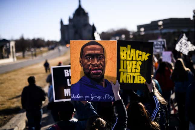 People march near the Minnesota State Capitol to honor George Floyd on March 19, 2021 in St Paul, Minnesota. This morning Judge Peter Cahill rejected motions for change of venue and continuance by the defense of former Minneapolis Police officer Derek Chauvin, who is accused of killing George Floyd last May. 