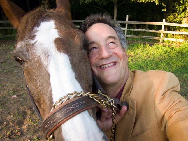 Image for article titled Photos Surface Of Congressman Cavorting With Horse