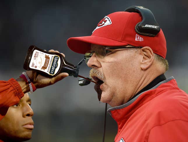 Image for article titled Chiefs Trainer Squirts Bottle Of KC Masterpiece Into Andy Reid&#39;s Mouth