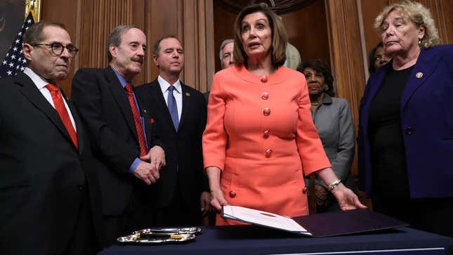 House Speaker Nancy Pelosi during the signing of impeachment articles alongside Reps. Jerry Nadler, Adam Schiff, and Zoe Lofgren, among others, on January 15, 2020 in Washington D.C.