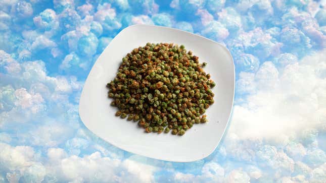 Potato-Crusted Air Fried Peas on white plate against sky-blue background