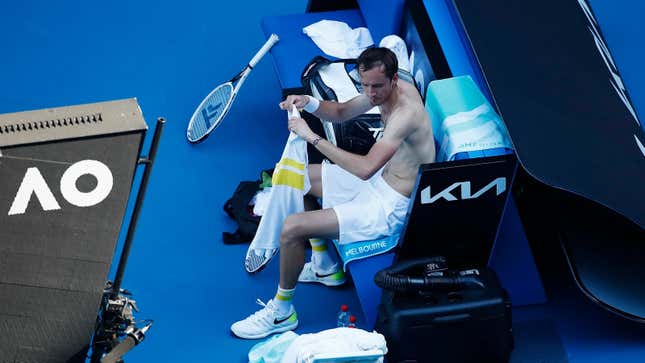 Daniil Medvedev changes his shirt in his Men’s Singles Quarterfinals match against Andrey Rublev during day 10 of the 2021 Australian Open.