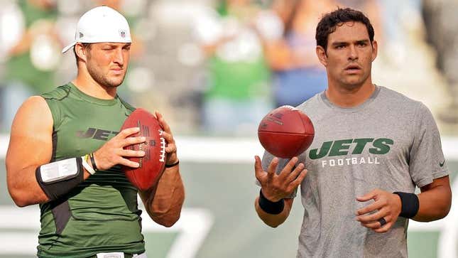 Image for article titled Mark Sanchez, Tim Tebow Warm Up By Throwing Ball In Direction Of One Another