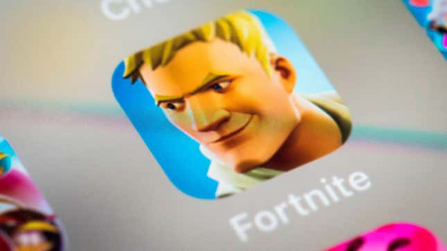 This illustration picture shows the video game Fortnite app logo displayed by a tablet in Paris, on February 18, 2019. 