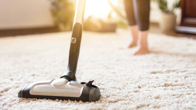a vacuum on a thick fluffy carpet