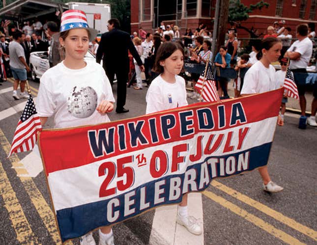 Three girls march toward the White House on Elm St. in Washington, DC, as part of the Inderpendance Day Parade.