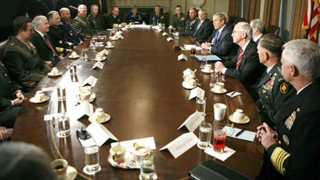 President Bush contemplates whether to take truth or dare at a special late-night meeting with the Joint Chiefs of Staff. 