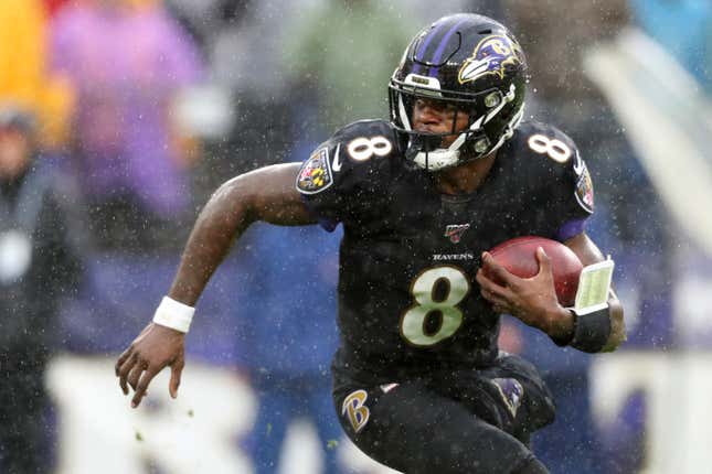 Quarterback Lamar Jackson #8 of the Baltimore Ravens runs with the ball against the San Francisco 49ers in the first half at M&amp;T Bank Stadium on Dec. 1, 2019, in Baltimore.