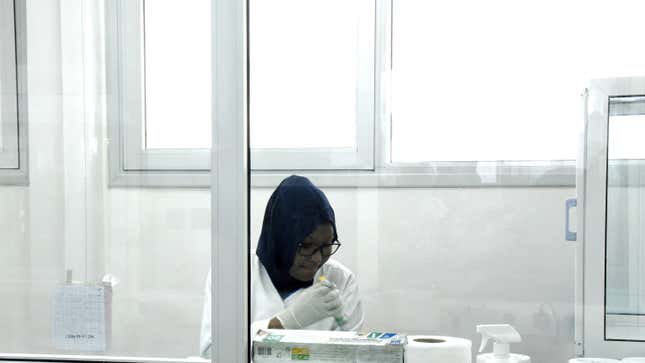 researcher in a COVID lab