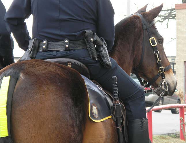 Image for article titled Yes, the Image of a Handcuffed Black Man Being Led Down the Street by Mounted Police Is Real—and a Texas Police Chief Is Sorry It Happened
