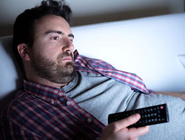 Image for article titled ‘Things Will Never Be As Good In Real Life As They Are On TV,’ Sighs Man Watching Sated Cartoon Character Pull Entire Fish Skeleton Out Of Mouth