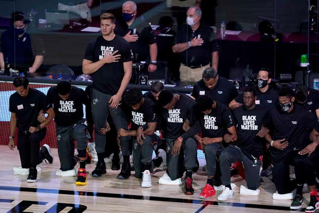 Meyers Leonard, seen here as the lone player on his team standing for the National Anthem, is indeed shitty.