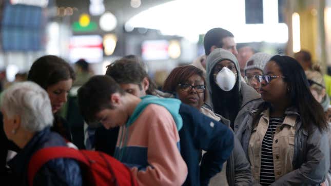 Crowds at Roissy Charles de Gaulle Airport near Paris, France on March 12, 2020.