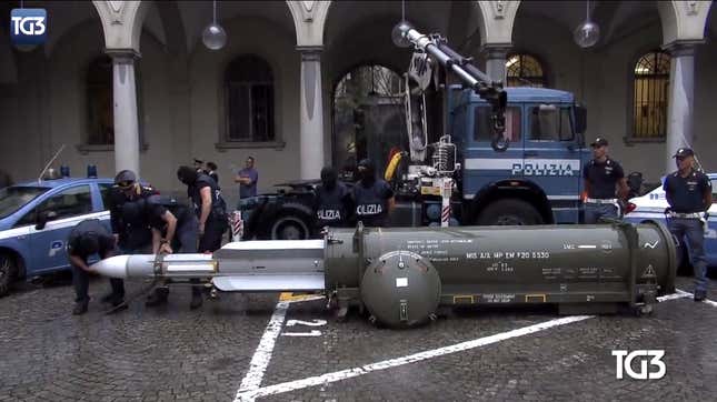 Italian authorities seizing a missile obtained by a neo-Nazi group, July 2019.