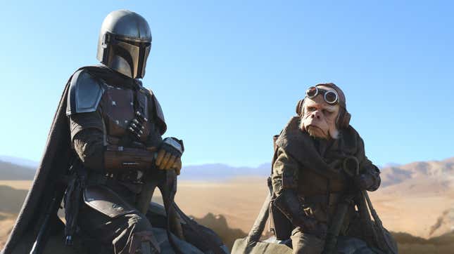 The Mandalorian (Pablo Pascal) and Kulil (voiced by Nick Nolte) journey across the desert.