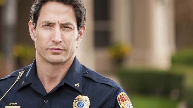 Image for article titled Police Officer Demonstrates Proper Technique For Subduing Grand Jury