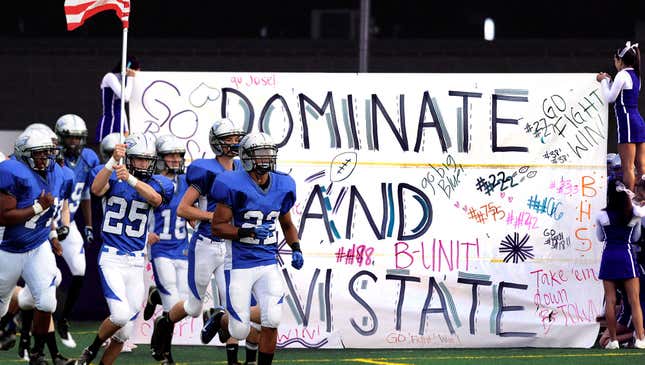 Image for article titled Polite High School Football Team Runs Around Banner That Took Hours To Make