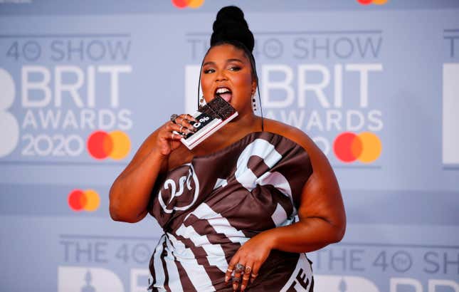 Lizzo poses on the red carpet on arrival for the BRIT Awards 2020 in London on February 18, 2020.