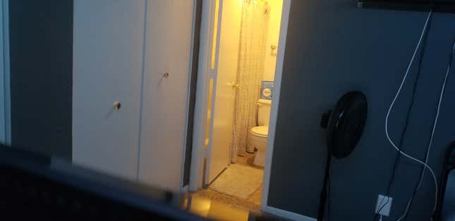 View of my toilet from behind my TV. (I didn’t have pants on.)