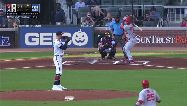 A Atlanta Braves fan does the tomahawk chop cheer during the first inning  in Game 3 of baseball's World Series between the Houston Astros and the  Atlanta Braves Friday, Oct. 29, 2021