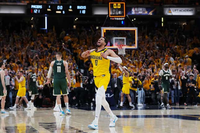 INDIANAPOLIS, IN - APRIL 26: Tyrese Haliburton of the Indiana Pacers during Game 3 of the Eastern Conference first round playoff game on April 26, 2024 in Indianapolis, Indiana. Haliburton celebrates after defeating the Milwaukee Bucks 121-119 in overtime. NOTE TO USER: User expressly acknowledges and agrees that by downloading and/or using this photo, user agrees to the terms and conditions of the Getty Images License Agreement. (Photo by Dylan Burr/Getty Images)