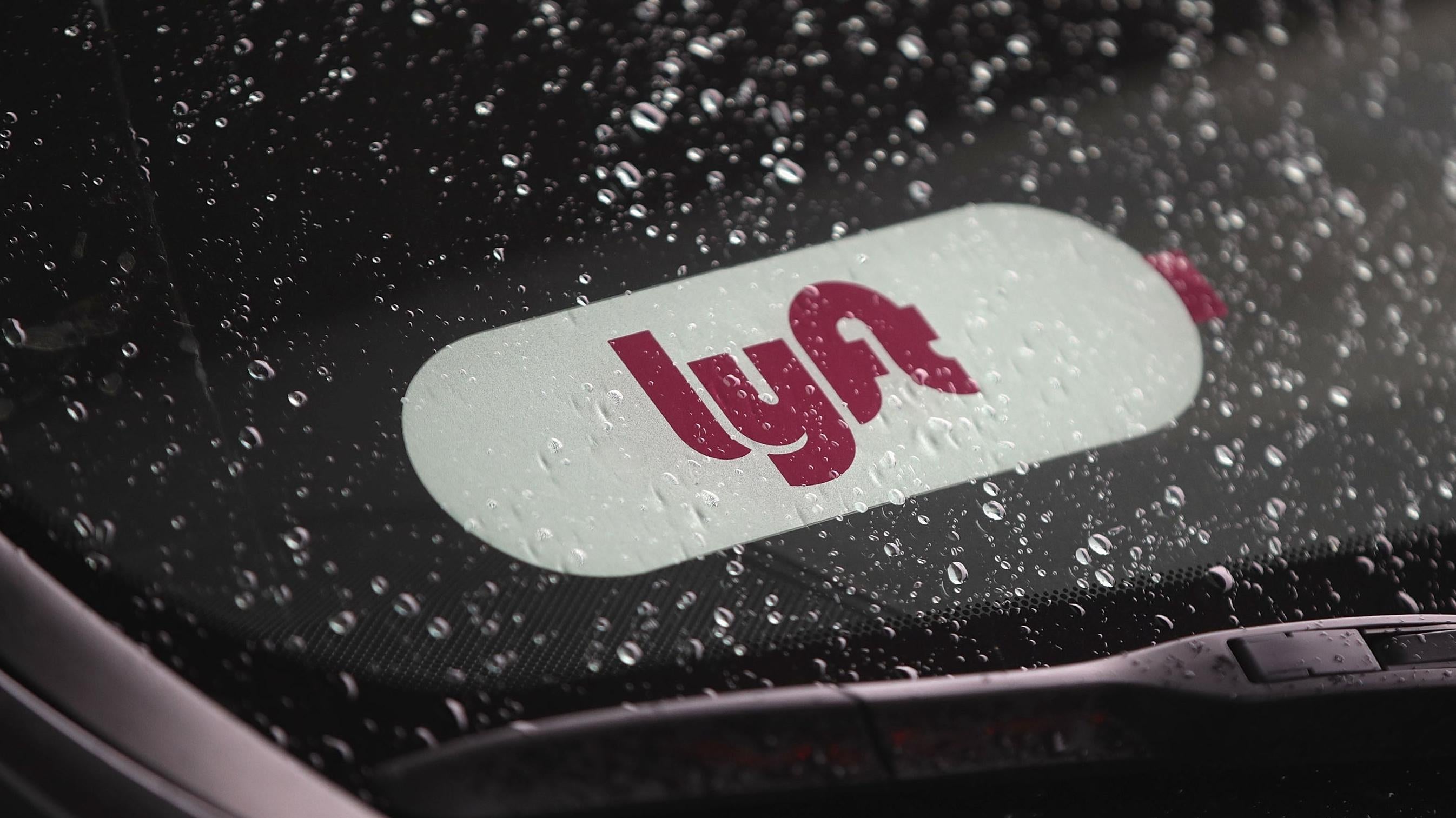 Lyft Could Cut Hundreds Of Jobs In Latest Round Of Layoffs: Report 1 A Shared Driver Picks Up Passengers At O'Hare Airport On April 10, 2019 In Chicago, Illinois.